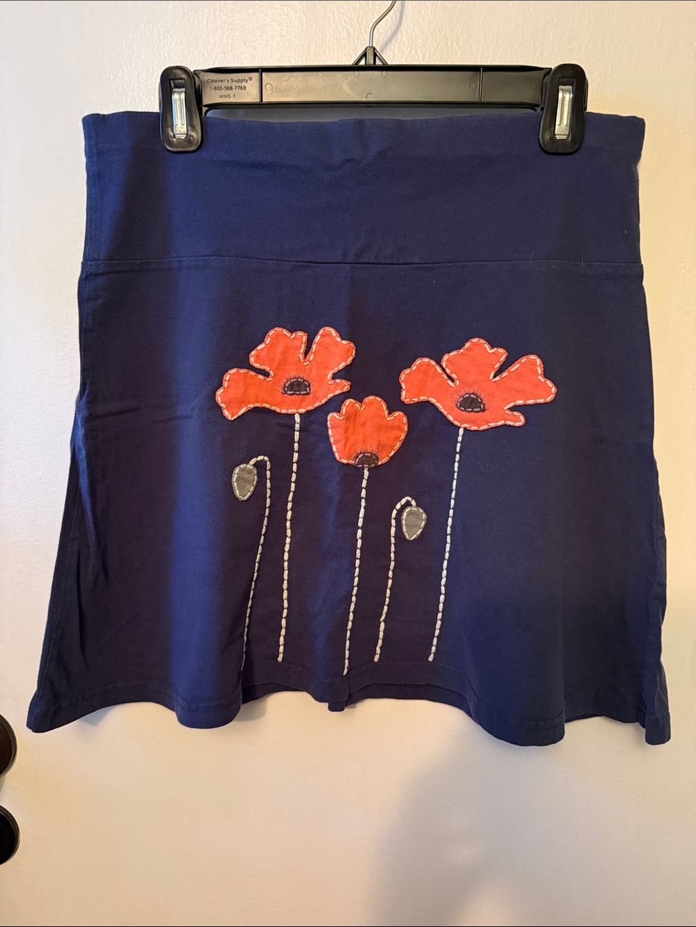 Navy Organic Cotton Floral Appliqué A-Line Skirt - Orange Flower Detail